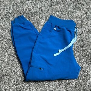 Bright blue high waisted figs